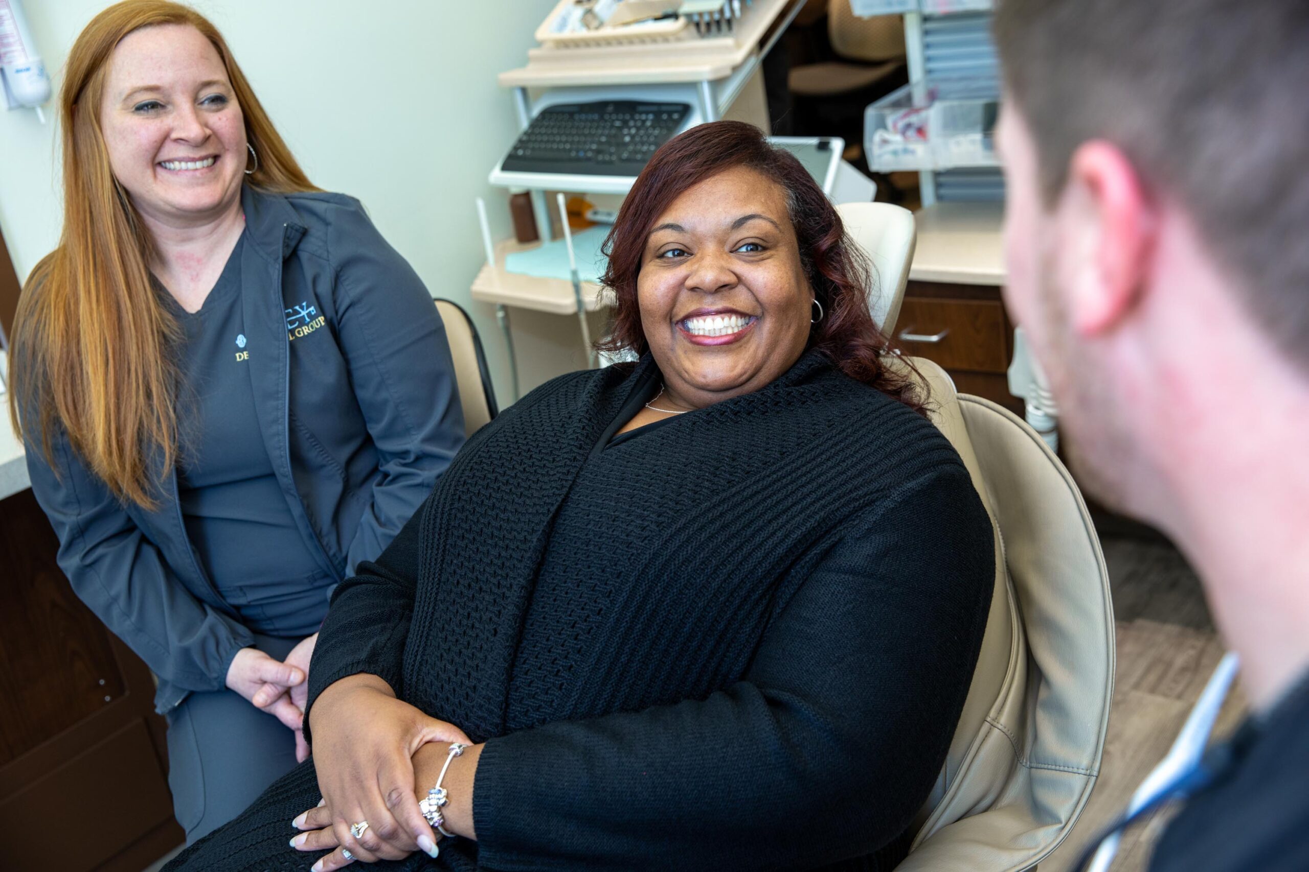 patient talking with a dentist