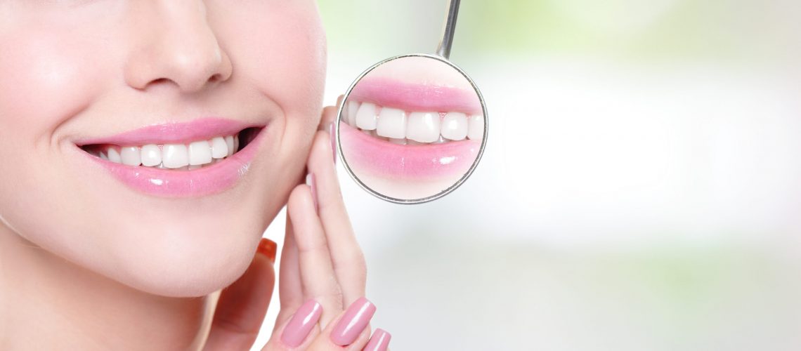 an image of a dental patient getting porcelain veneers.